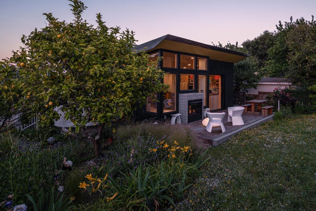 Sausalito Modern Update rear 3/4 with dusk landscape